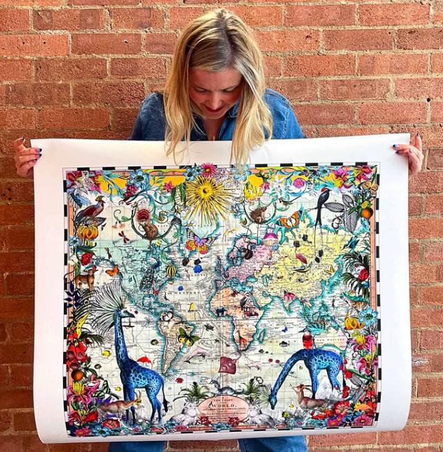 Giraffa Discoveries Of The World - Framed by Kristjana S Williams